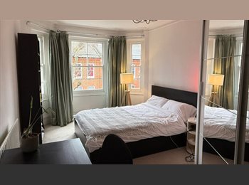 Roomgo UK - En Suite Double 1min away from district line! OPEN TO SHORT TERM TENANCIES!, West Kensington - £1,400 pcm