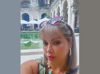 Roomgo BR - Elaine  - 47 - Botafogo